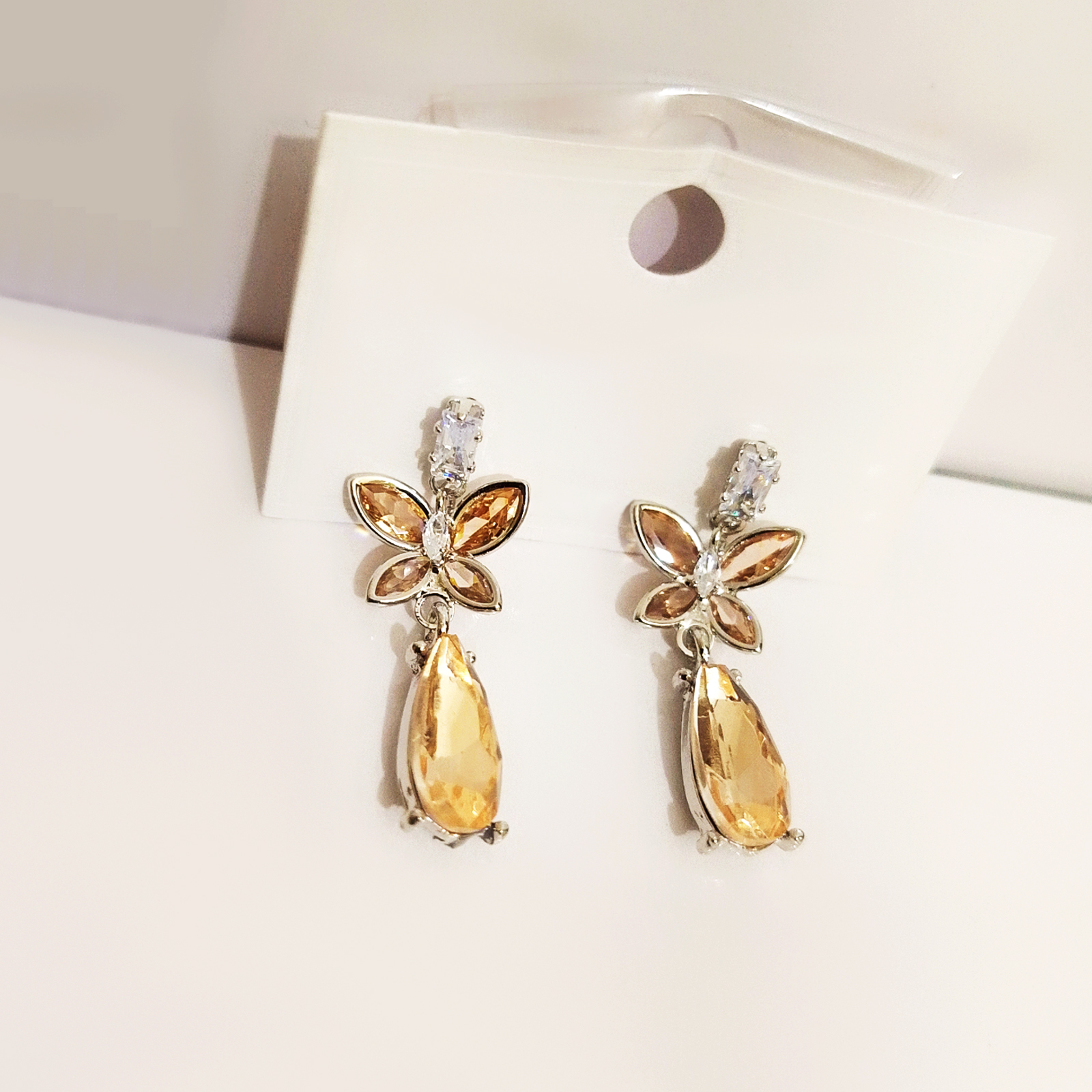 Champagne Crystal Teardrop Dangle Earrings with Floral Silver-Tone Accents - Image 2