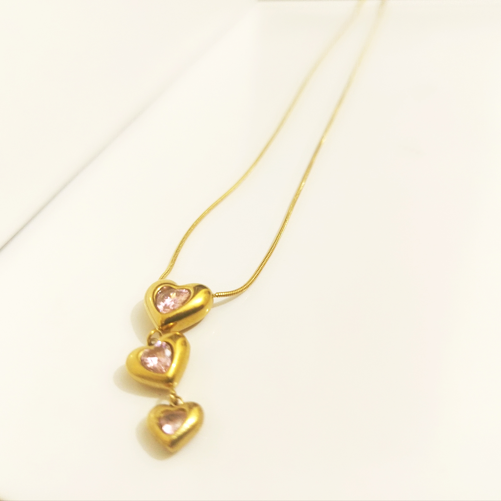 Triple Heart Drop Pendant Necklace with Pink Crystals (Gold-Tone) - Image 2